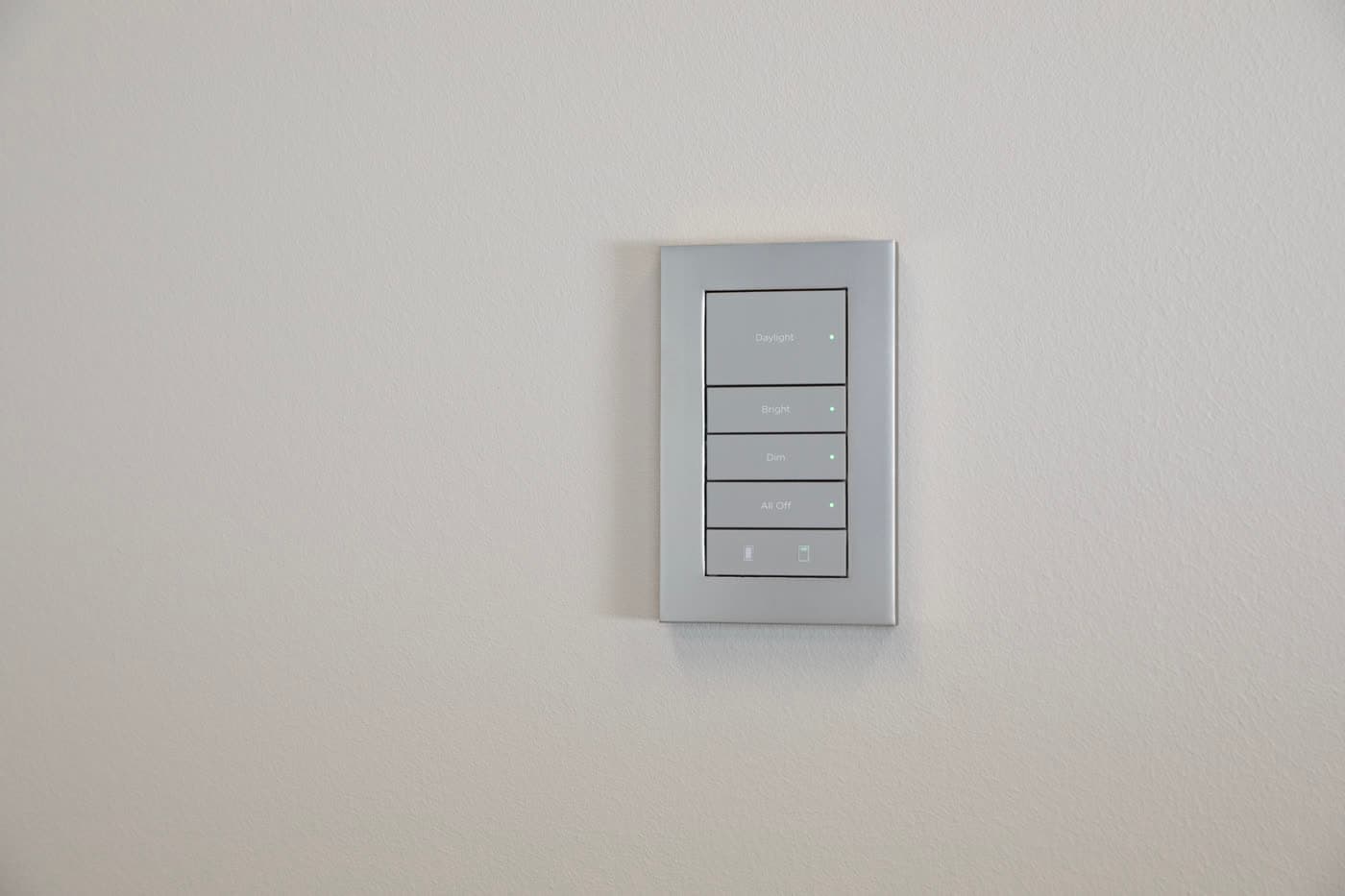A satin nickel keypad engraved with named lighting scenes