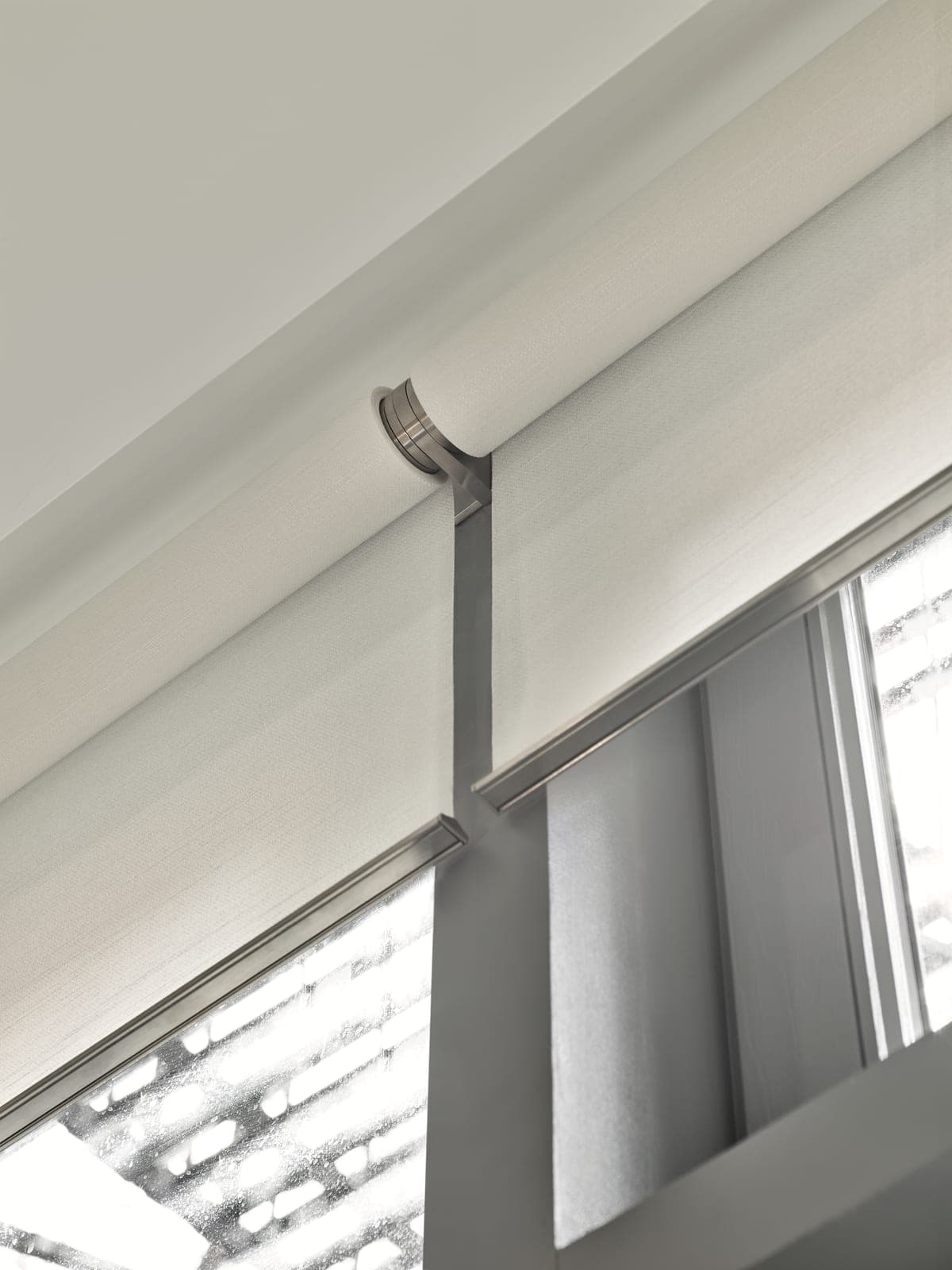 Automated blinds and curtains detailed neatly into a window reveal