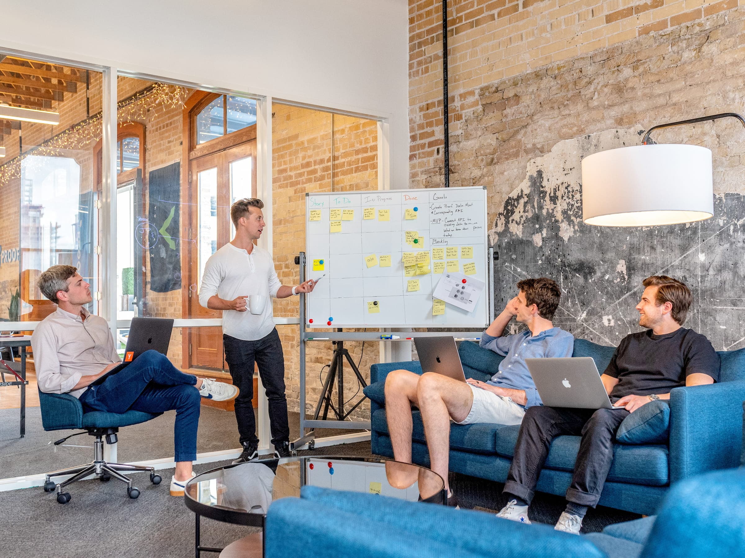 An architect and smart-home designer reviewing plans together